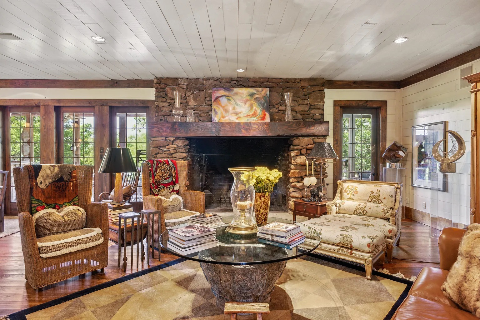 The Great Room · A Stone Fireplace That Anchors It All
