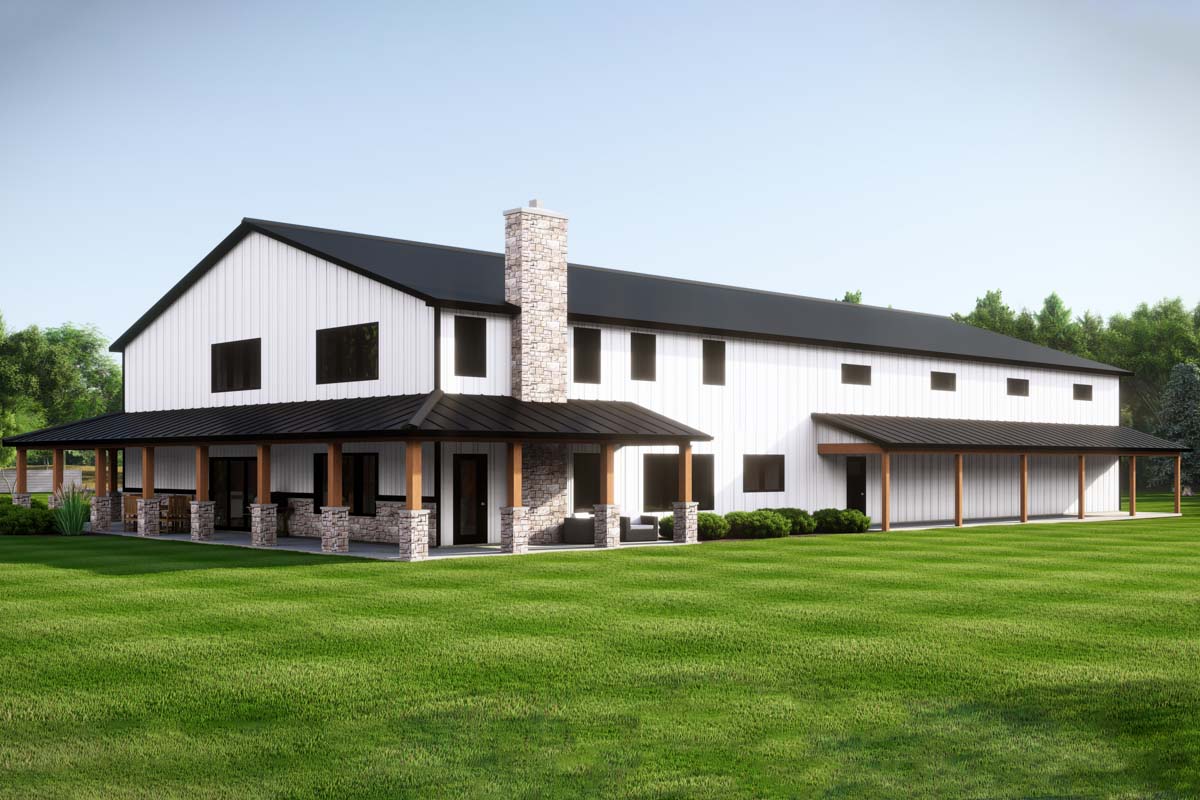 Modern farmhouse barndominium with wraparound porch, stone chimney and metal roof
