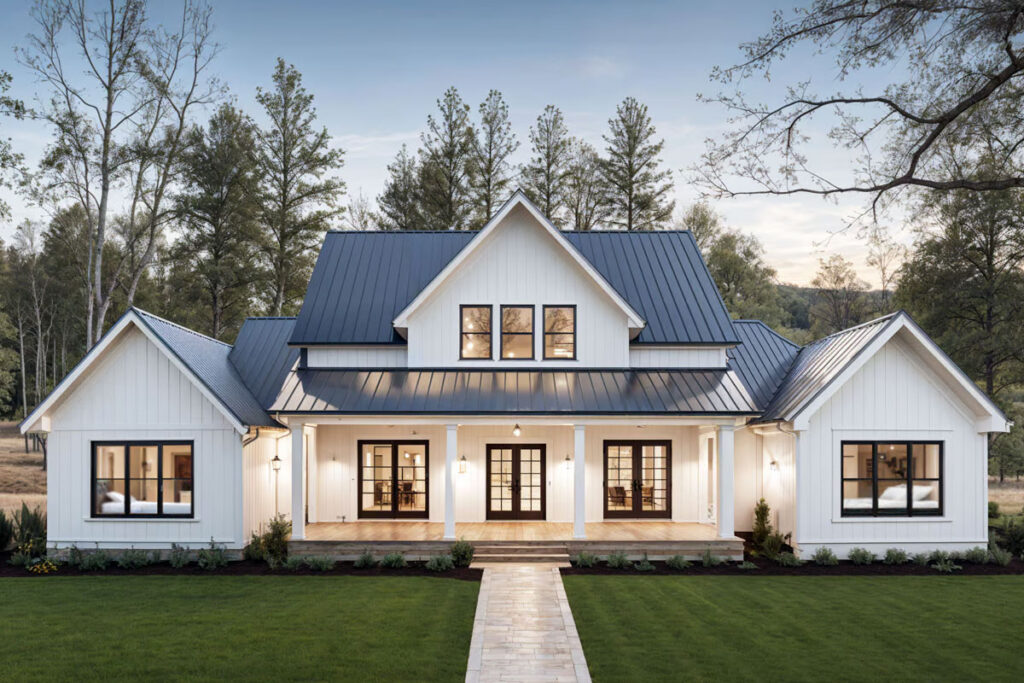 Modern farmhouse exterior with two-story layout, front porch, gables and dark metal roof