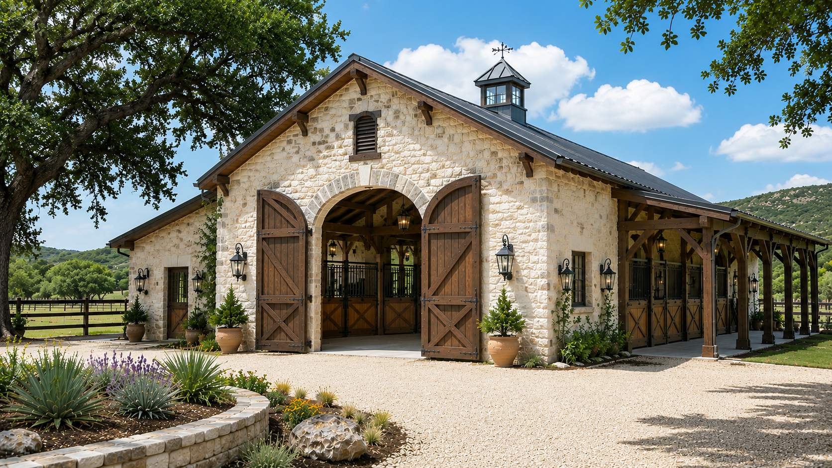 Limestone ranch barn with arched timber doors and covered shed row — Hill Country Hacienda AI concept home