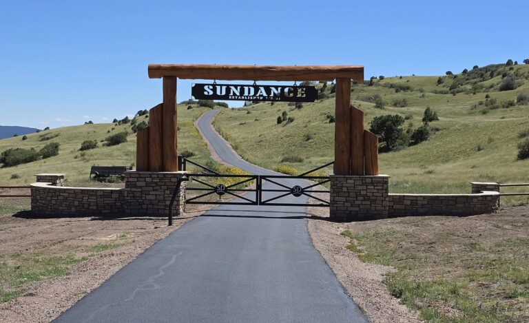 frisco gate timber ranch entrance stone walls sign 768x469