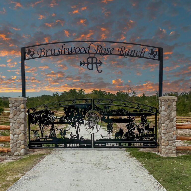 trails west ranch entrance arch longhorn wildlife gate stone columns 768x768