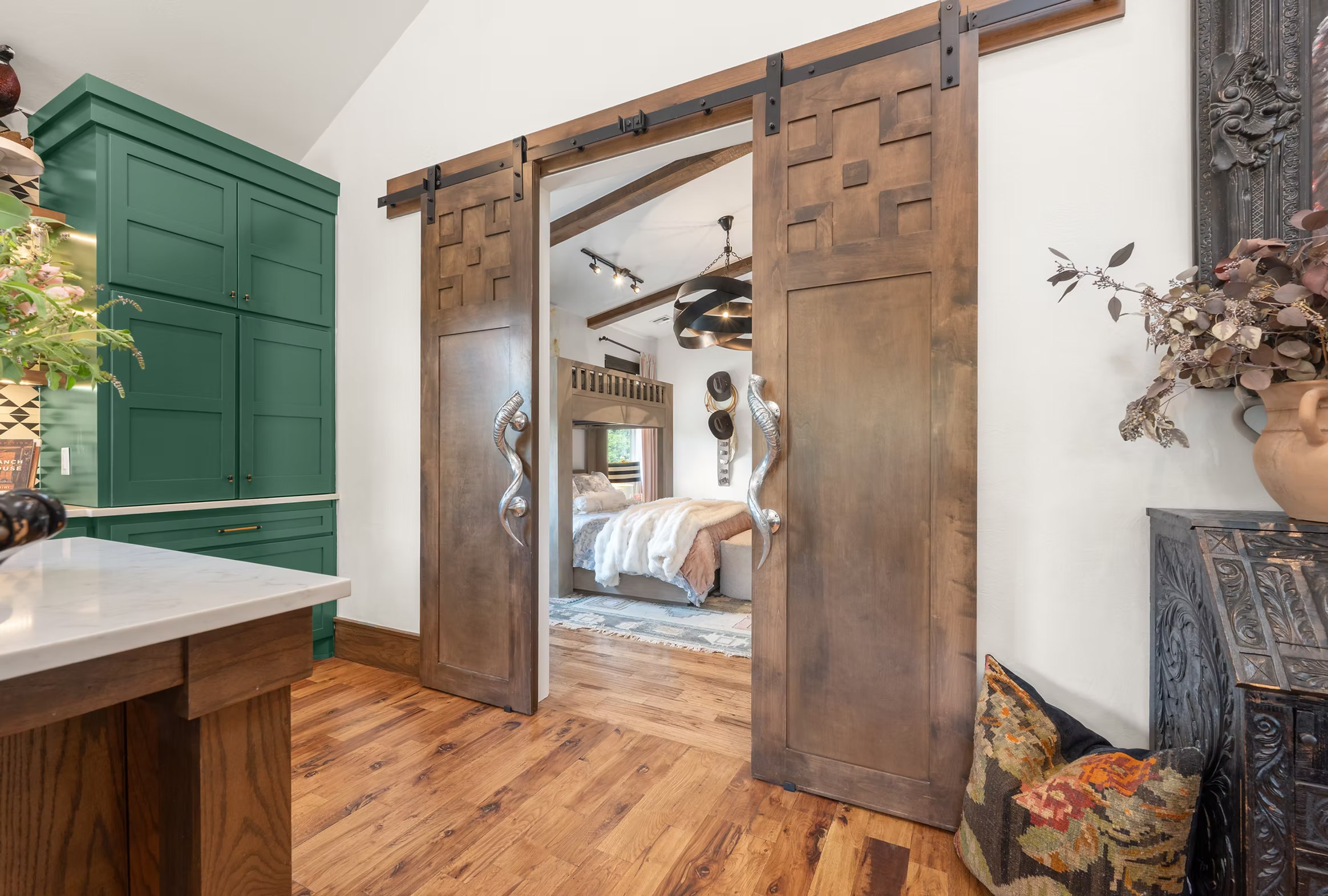 Carved wood door with stepped geometric relief panels