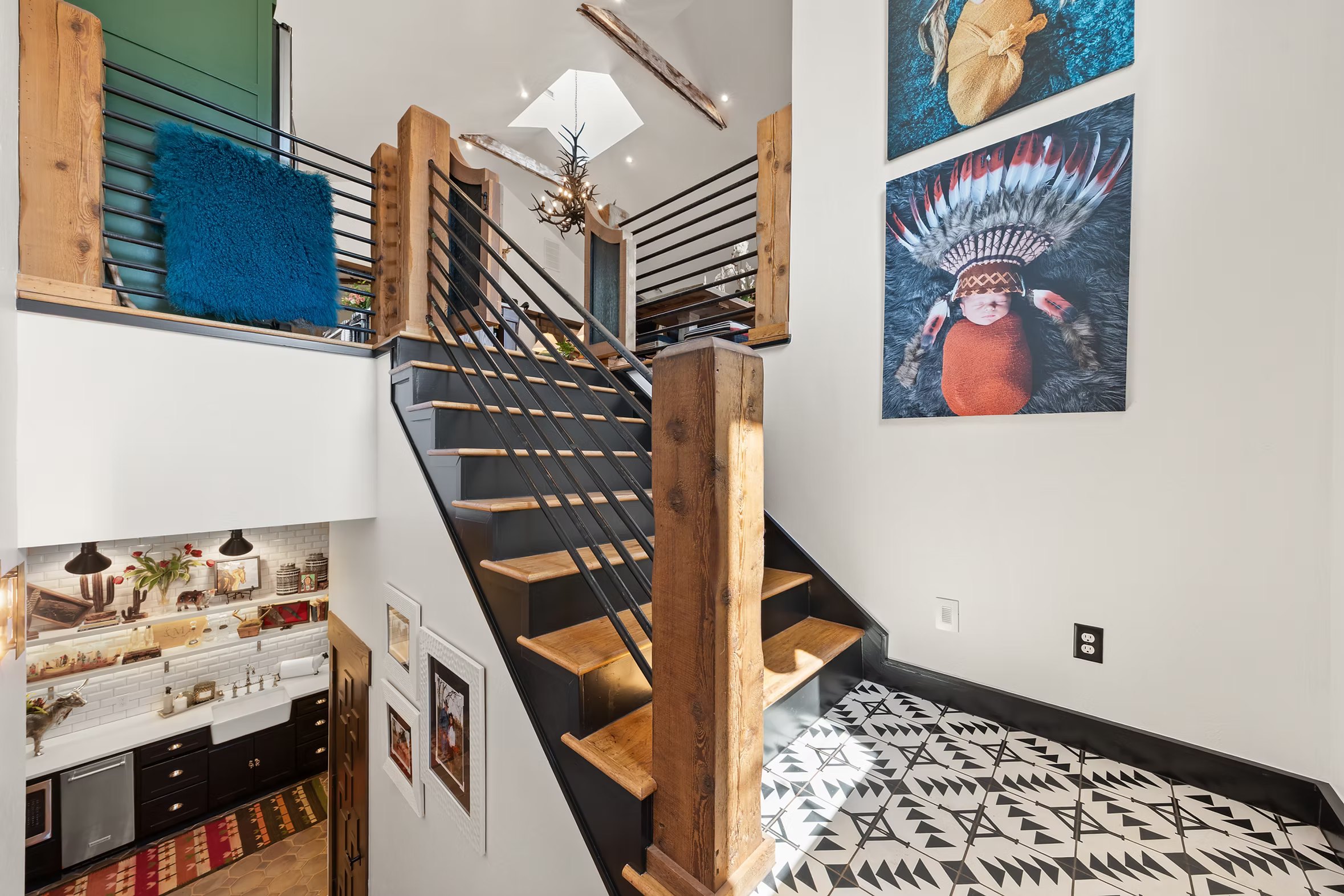 Stairway rising from the barn level to the residence above