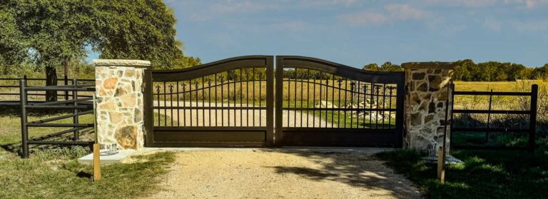Classic Fleur de Lis Ranch Entrance in Cat Spring TX 768x279