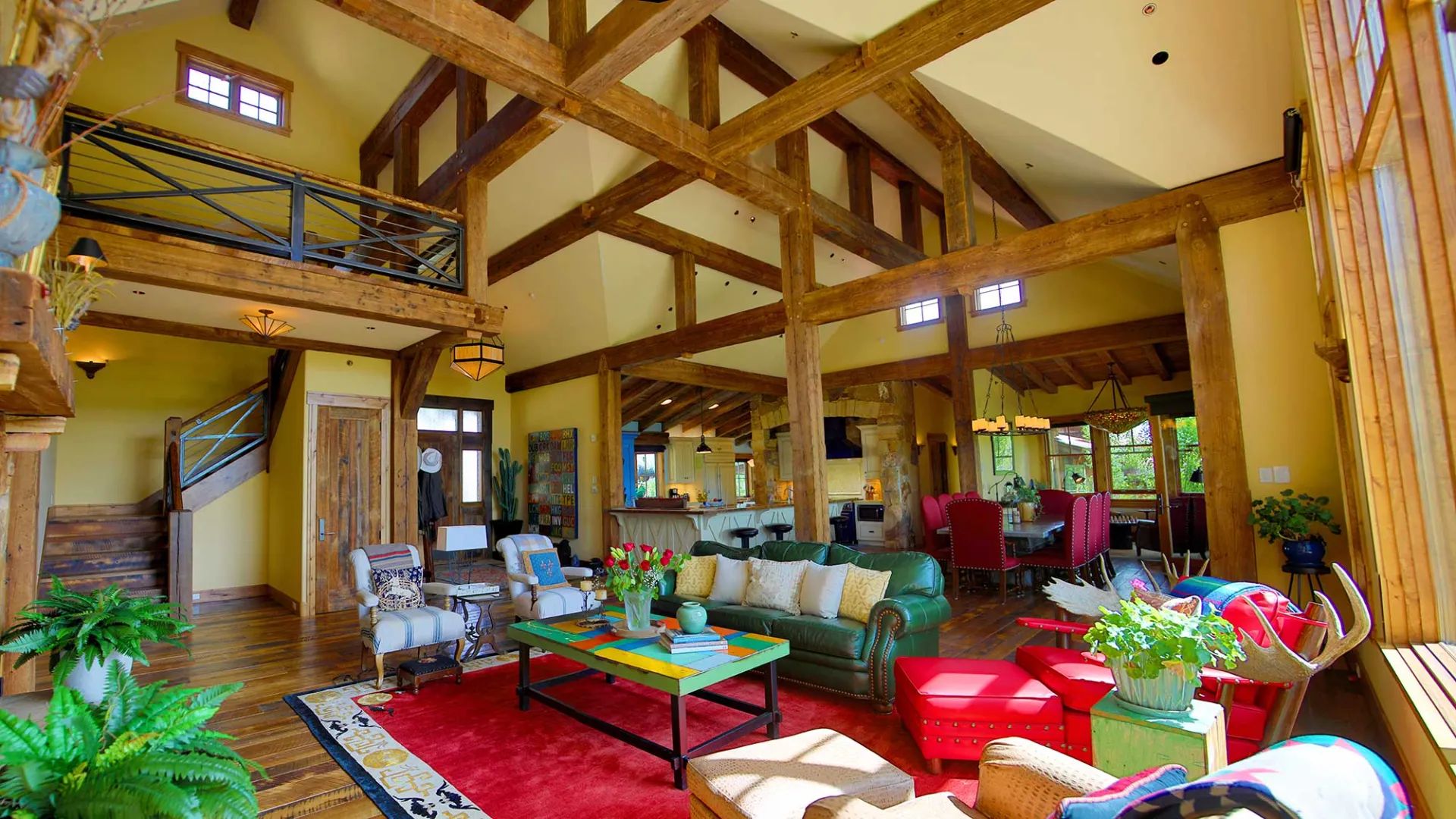 Great room under reclaimed Kentucky tobacco barn timbers at Eagle Ridge Ranch, Gunnison, Colorado