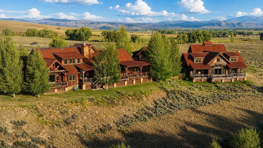 Timber and stone mountain home at Eagle Ridge Ranch Homestead #2 with the mountains beyond, Gunnison, Colorado