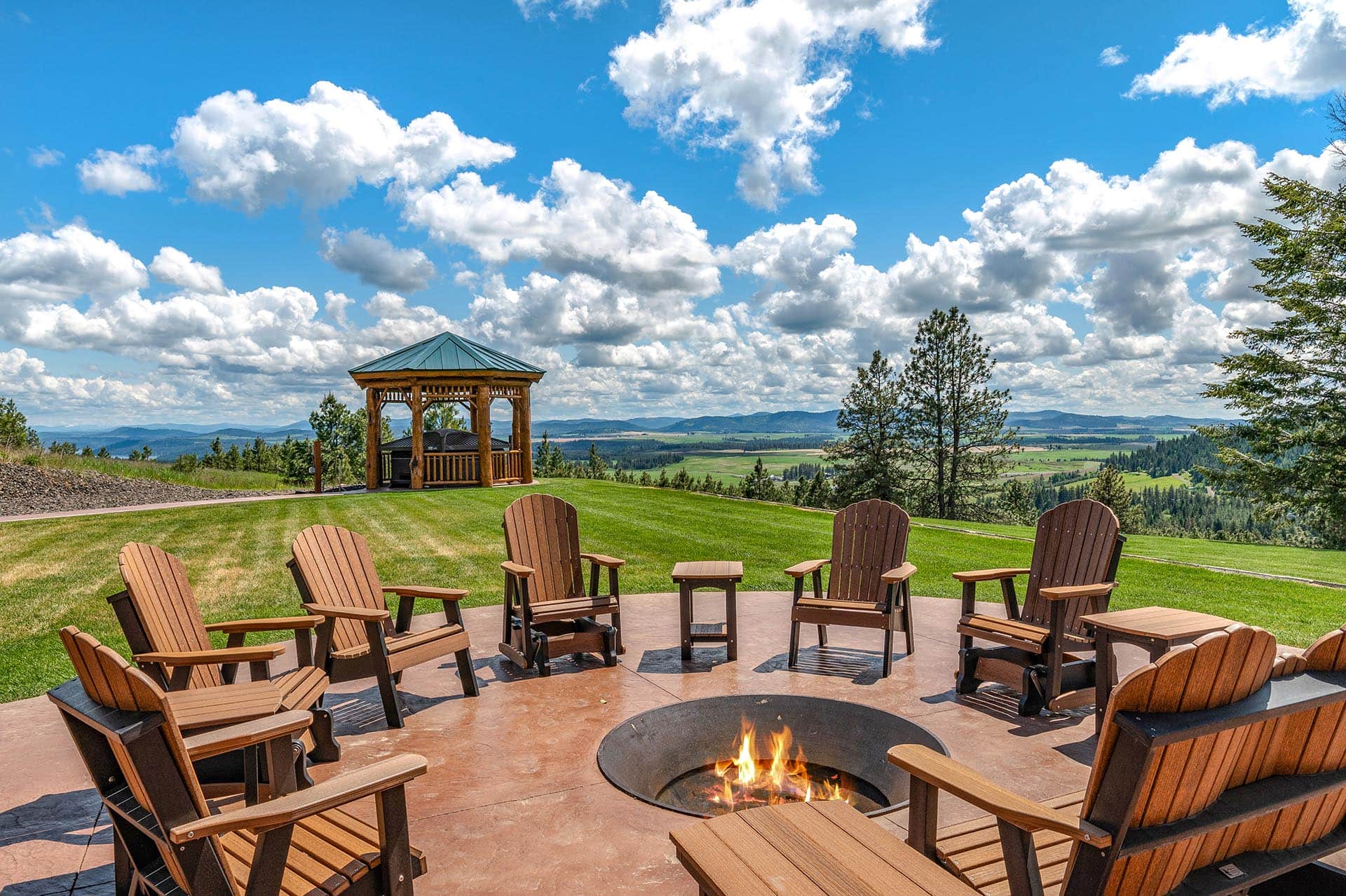 Outdoor fire seating with Lake Coeur d'Alene views at Painted Rose Ranch