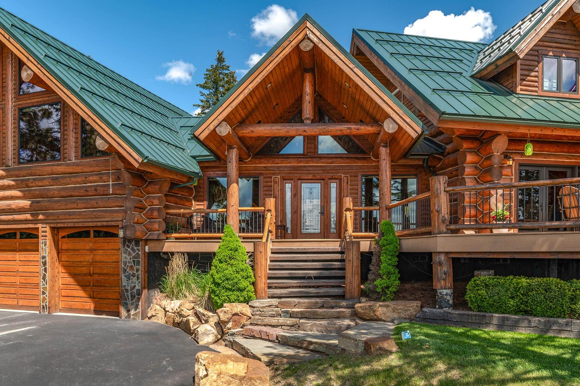 Log home front entry at Painted Rose Ranch