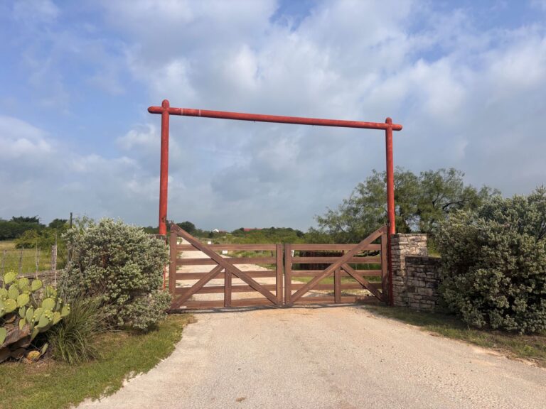 Working ranch entrance by Aberdeen Custom Gate & Iron