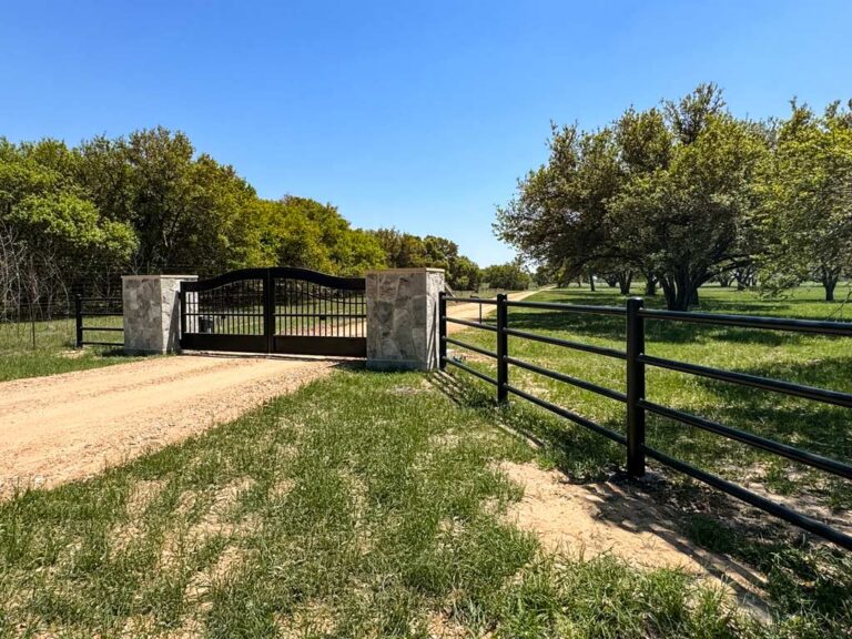 custom ranch entrance with stone columns 768x576